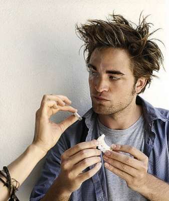 pics of robert pattinson smoking. Robert Pattinson Posed in